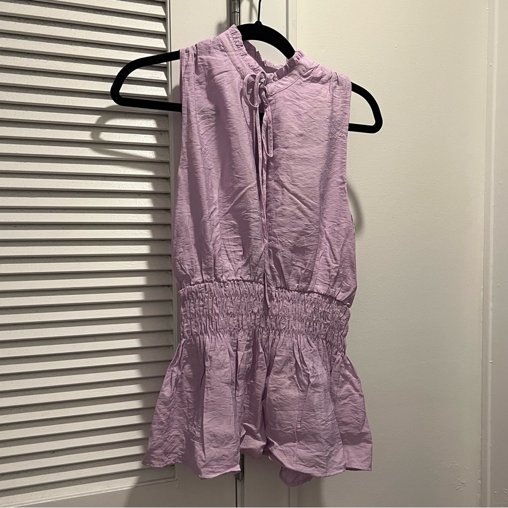 Purple, peplum-style top from Dress Up. Size large.